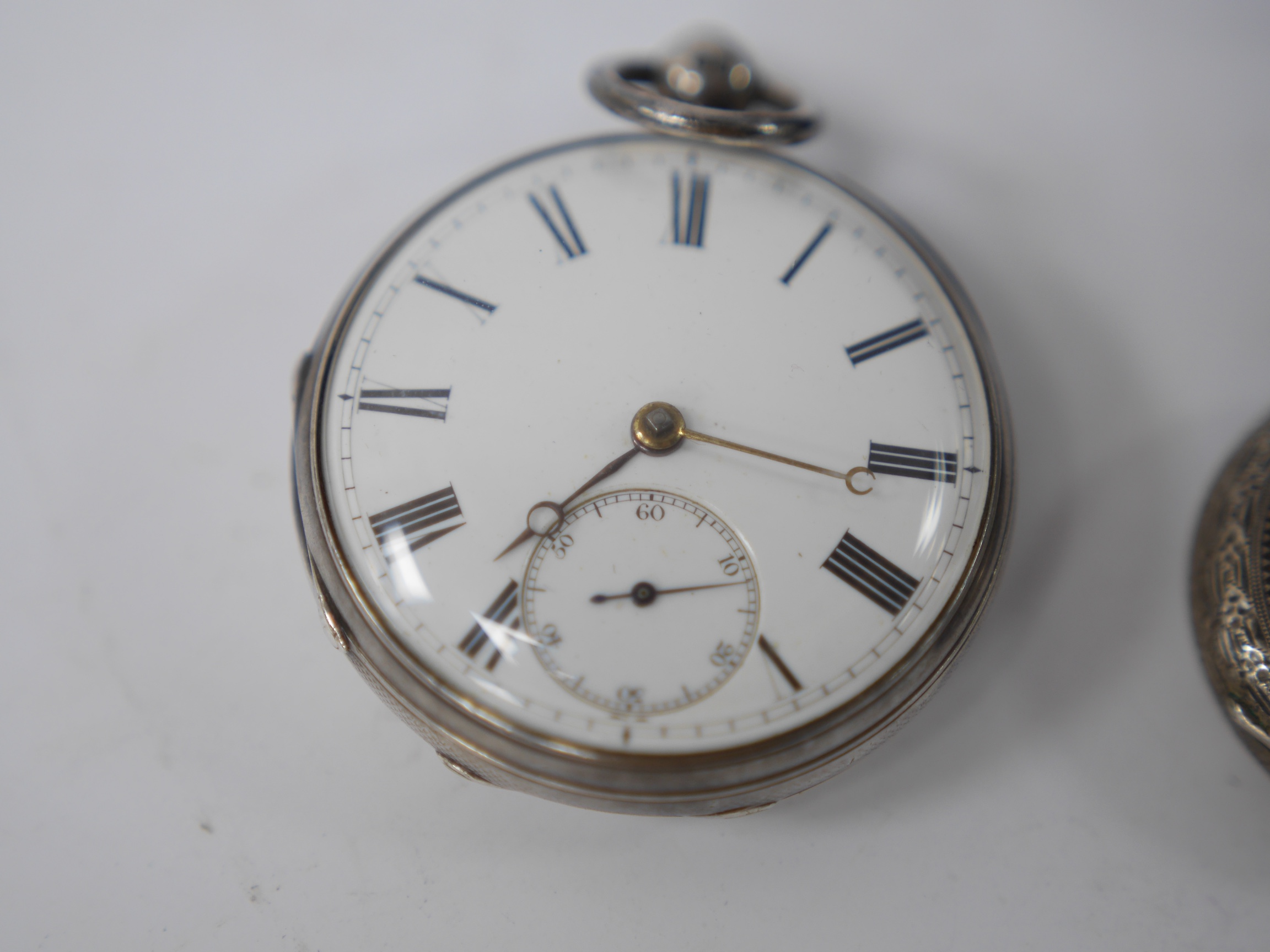 Six assorted pocket and fob watches, including a Victorian silver open faced, case diameter 62mm, a silver half hunter pocket watch with a silver albert and a small plated bosun's call. Condition - poor to fair to good